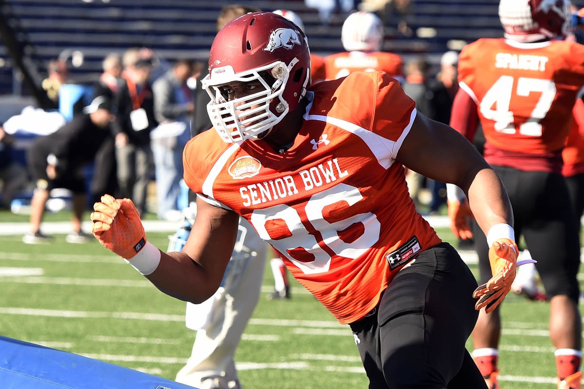 That red Razorback helmet with the orange jersey is all kinds of wrong.